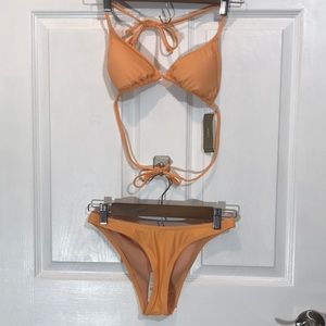 JCREW LIGHT ORANGE MATCHING SWIMSUIT. TOP XS BOTTOM XXS
